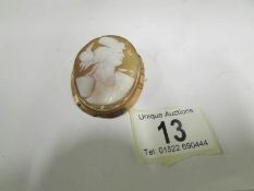 A Victorian 9ct rose gold set cameo with