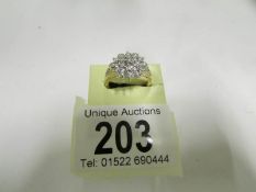 An 18ct yellow gold floral diamond ring,
