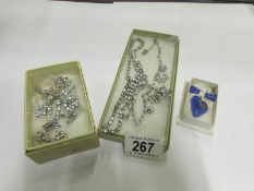 2 diamonte' necklaces, brooch, earrings