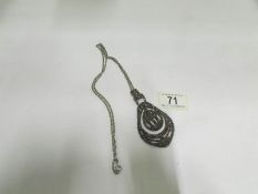 A vintage cut steel pendant