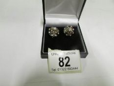 A pair of multi gem screw back earrings