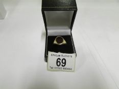 A 9ct gold gentleman's ring set cornelia