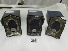 3 boxed sterling silver photo frames