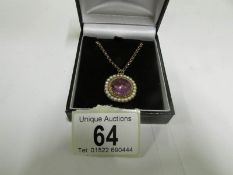 An antique amethyst and pearl pendant in