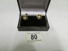 A pair of 14ct gold screwback earrings s