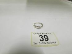 A single stone white gold diamond ring