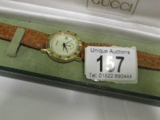 A gent's Gucci watch, in working order