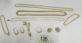 A mixed lot of gold chains, rings, brace