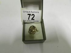 A 9ct gold ring set smoky quartz, size M