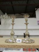 A pair of Edwardian scalloped edge silve