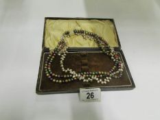 A multi coloured cultured pearl necklace