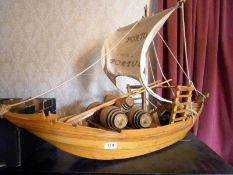 A hand built model of a cargo boat