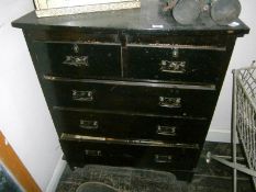A chest of 5 drawers