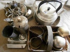 A quantity of metalware, moulds & trays