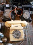 3 dial telephones