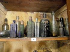 A large quantity of old bottles (1 shelf