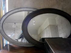 2 bevel edged oval mirrors