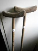 A pair of wood crutches