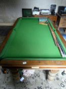 A Riley snooker table with 2 sets of bal