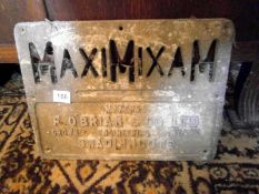 A cast metal sign 'Maximixam' swadling c