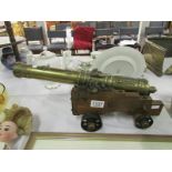 A model of a French cannon with brass ba