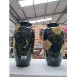 A pair of overpainted vases with bird an