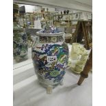 A large handpainte Japanese lidded jar