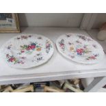 A pair of floral decorated plates