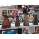 4 Art Deco copper 'lizard skin' jugs by