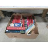 A box of books including Enid Blyton