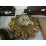 A sunburst clock (key in office)