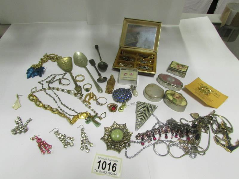 A mixed lot including earrings, pill box