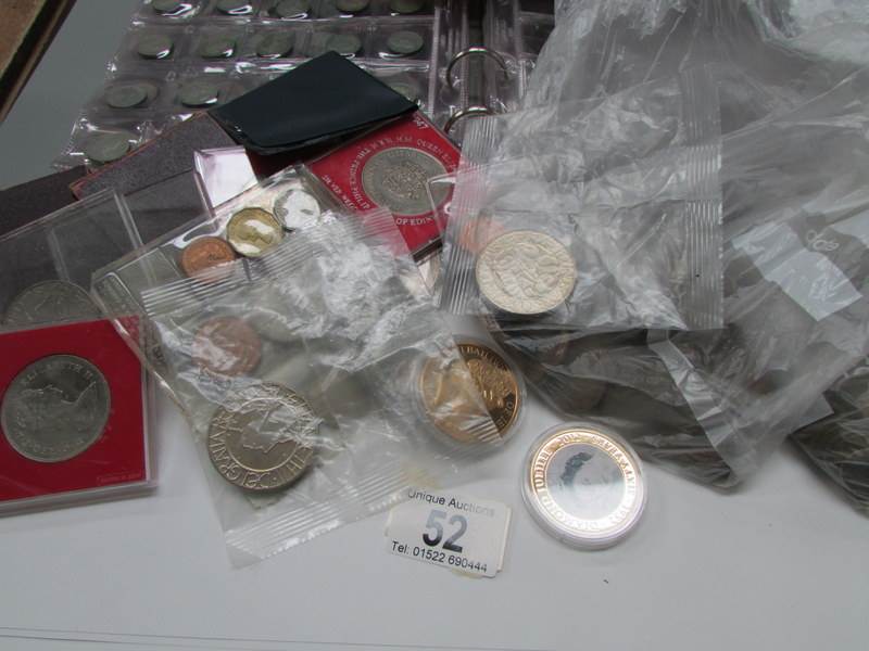 A mixed lot of coins, bank notes etc., i