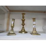 A pair of brass candlesticks a/f and one