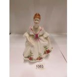 A Royal Doulton figurine, 'Country Rose'