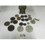 A mixed lot of coins and medallions etc