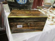 A coromandel and brass bound sewing box
