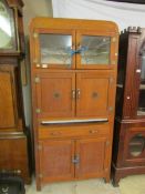 A 1950's kitchen cabinet