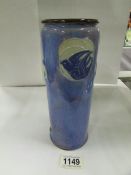 A Royal Doulton blue vase decorated with