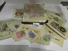 An album and other silk greeting and pos