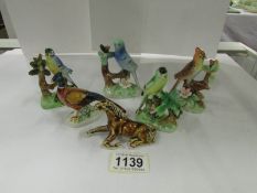 4 bird figures, a pheasant and a horse
