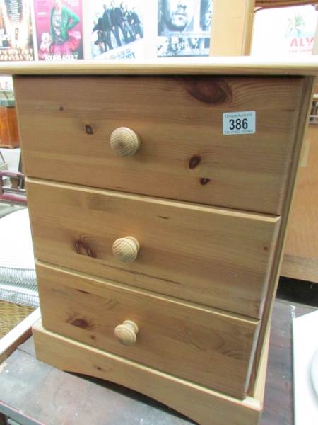 A pine bedside chest