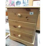 A pine bedside chest