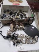 A box of costume jewellery including M &