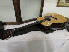 A cased 'Elevation' classical guitar