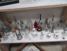 A mixed lot of glass and china bells