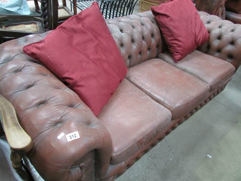 A leather Chesterfield sofa