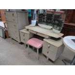 A retro dressing table with stool and ma