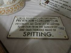 A cast iron sign 'L B & SCR Spitting'