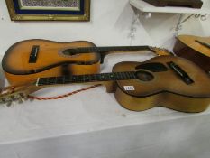 2 accoustic guitars